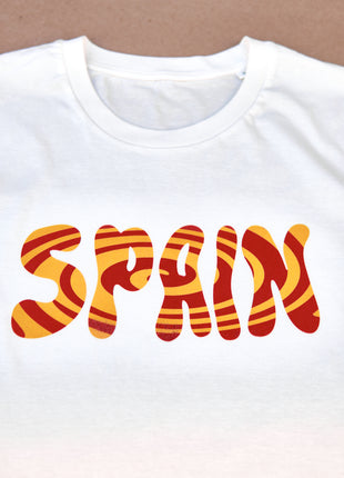 T-shirt Spain Unisex Medium FitThis T-shirt impresses with its unique "blubby twirl" design with the word "SPAIN" printed in the traditional colors of the Spanish flag: red and yellow. Made of 100% organic cotton, it is not only comfortable but also refle